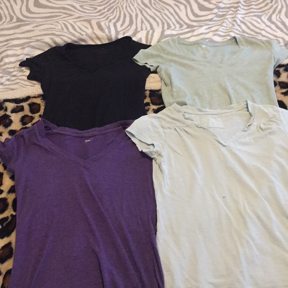a bundle of 4 V-neck tee shirts